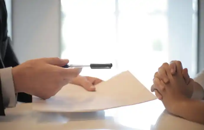 Person signing a contract